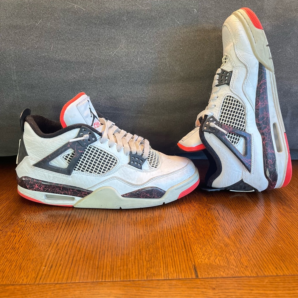 White and Red Jordan 4 Sneakers with Black Accents